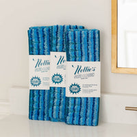 Nellie's Scrub & Polish Pads 3 pack on clean bathroom counter