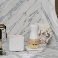 Nellie's Kitchen Brush and Nellie's Dish Butter beside kitchen sink