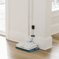 Wow Too Mop charging against the wall.
