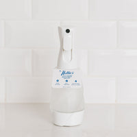 Nellie's One Bottle in a reusable glass spray bottle with long fine mist in frosted glass