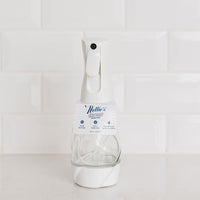 Nellie's One Bottle in a reusable glass spray bottle with long fine mist in clear glass