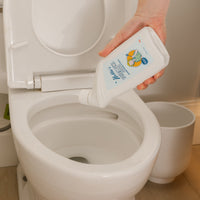 Person cleaning toilet with Nellie's Toilet Bowl Cleaner