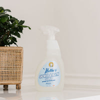 Nellie's Shower & Bath Cleaner with a refreshing lemongrass scent