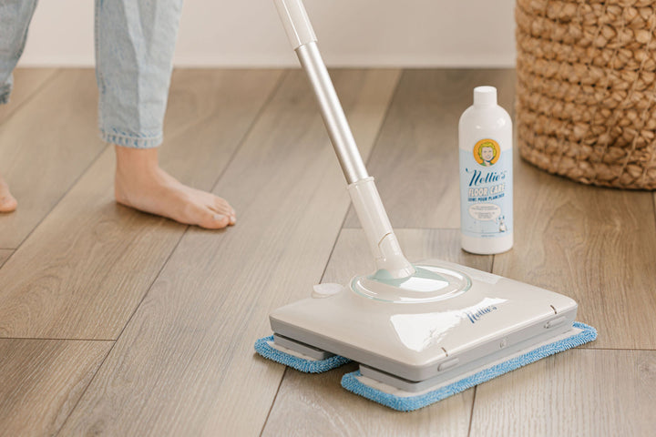 Mopping the floors with Nellie's Floor Care and WOW Mop.