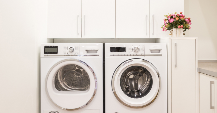 Washer and dryer in laundry room. 