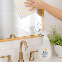Cleaning a mirror with All-Purpose Cleaner