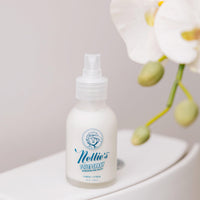 Nellie's Toilet Spray on the back of a toilet
